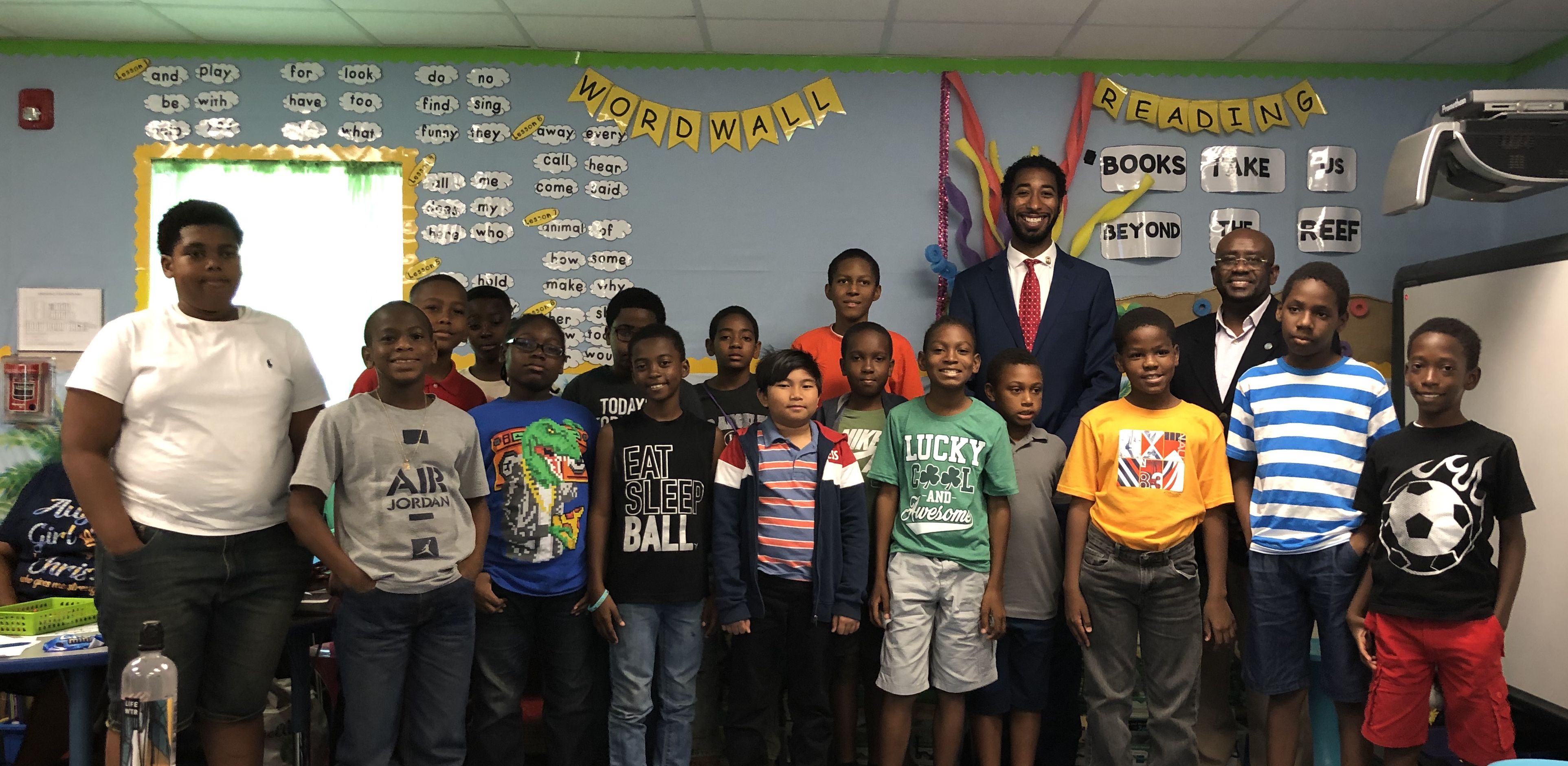 Gentlemen of eSTEAM coders with Joshua Mitchell and Senator Benta.jpg